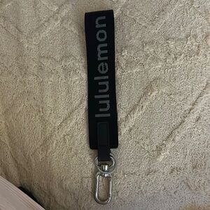 Black Lululemon keychain